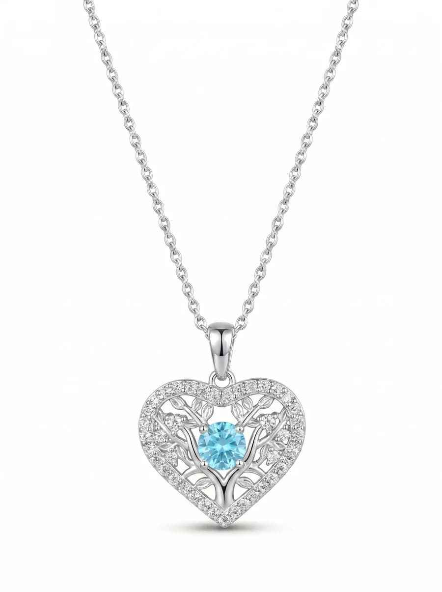 Filigree Heart Pendant — Light Blue Sapphire